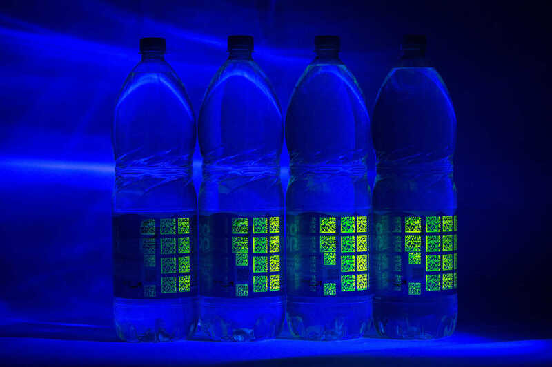 Applying Polytag's QR codes and UV tags to own-label PET bottles for Co-op's use every time Co-op, own-label, PET bottles, Polytag, QR codes, UV tags Food and Beverage Business