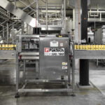 Europe welcomes the first-of-its-kind automated handle applicator, introduced by PakTech and Braukon. automated handle applicator, Braukon, Europe, PakTech Food and Beverage Business