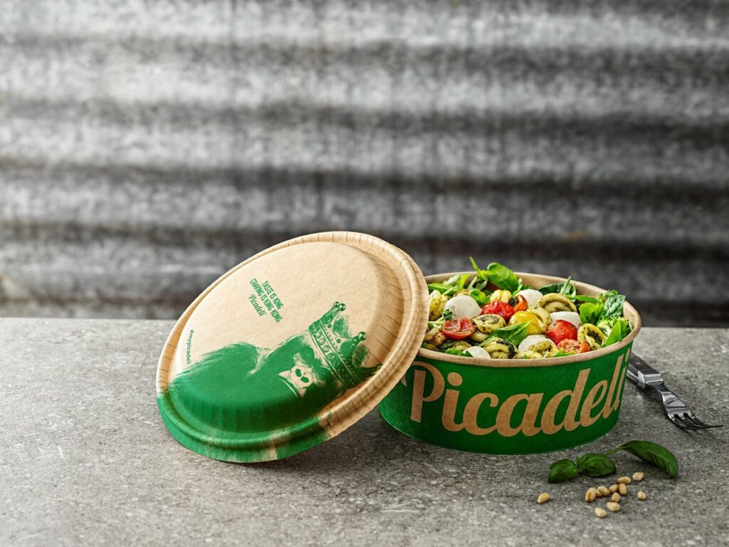 Graphic Packaging International and Picadeli partner to develop plastic-free fiber-based snap-closing lid puzzle for paper-based salad bowls. Food and Beverage Business Graphic Packaging International and Picadeli partner to develop plastic-free fiber-based snap-closing lid puzzle for paper-based salad bowls. Bio-based, food and drink packaging, food and drink sustainable packaging, Food packaging Food and Beverage Business