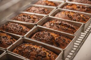 Sweet Innovations: The Future of Bakeries and Confectioners Food and Beverage Business Bakeries and Confectioners, bakery industry trends, confectionery innovations, specialty diet bakery, sustainable baking, value-driven consumers, bakery technology, artisanal bakeries, experiential cafes