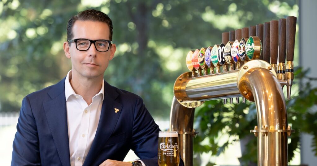 Carlsberg Finalizes Acquisition of Britvic Food and Beverage Business Carlsberg Finalizes Acquisition of Britvic chain, close up, Closed, copy space, equipment, gate, hanging, horizontal, household objects/equipment, industry, keyhole, Lock, Macro, metal, nobody, objects/equipment, outdoors, padlock, Protection, Red, Security, security equipment, single object, steel, weathered Food and Beverage Business
