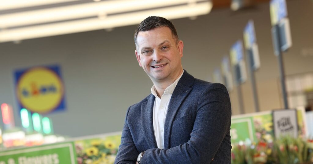 Lidl Names New Regional Managing Director for Northern Ireland appoints, caucasian, consumer, dairy products, Female, glasses, grocery aisle, grocery shopping, Lidl, managing director, NEW, NI, packaged foods, Purchase, refrigerated section, regional, variety, Woman Food and Beverage Business