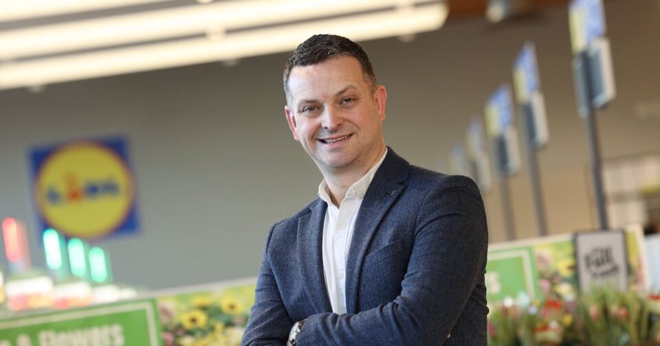 Lidl Names New Regional Managing Director for Northern Ireland appoints, caucasian, consumer, dairy products, Female, glasses, grocery aisle, grocery shopping, Lidl, managing director, NEW, NI, packaged foods, Purchase, refrigerated section, regional, variety, Woman Food and Beverage Business