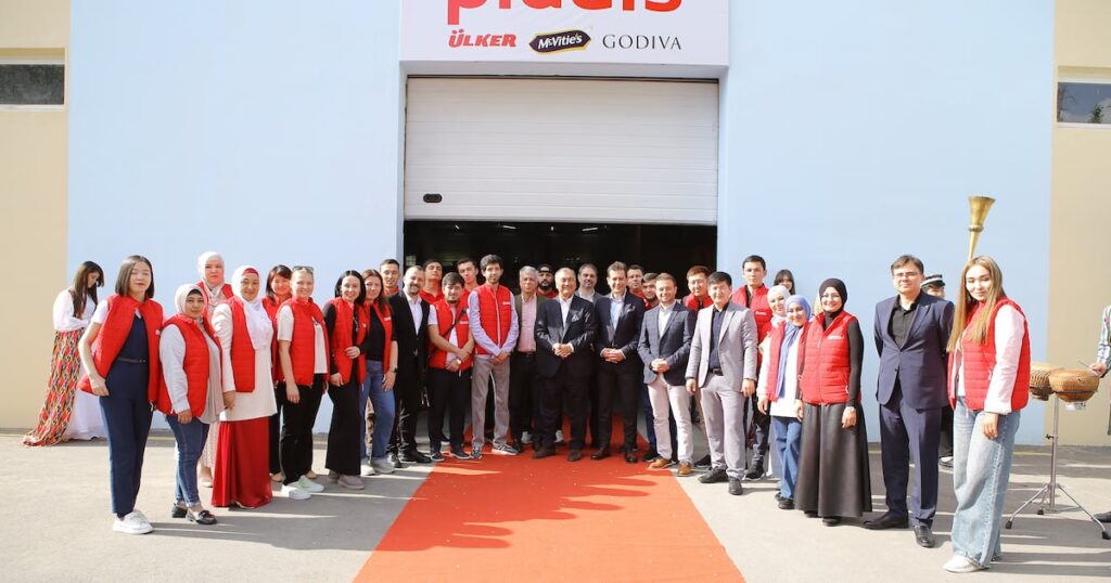 McVitie's Parent Company Increases Its Footprint in Asia 20 to 24 years, 40 to 44 years, abundance, Asia, blue collar worker, colleague, concentration, England, equipment, expands, factory, Female, focus - concept, Food Industry, fresh, hair net, handmade, hispanic ethnicity, hygiene, indoors, kings cross, London, Making, male, man, manufacturing machinery, mature adult, mature man, mature woman, McVitie's, occupation, overalls, owner, pasta, pasta factory, preparation, presence, protective clothing, protective glove, quality, Raw, skill, small group of people, storage equipment, tortellini, tray, United kingdom, wearing, Woman, Worker, working, young adult, young man, young woman Food and Beverage Business