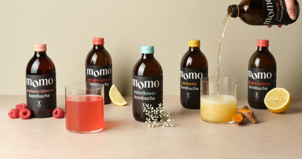 Momo Kombucha Closes £2M Funding Round blond hair, business, buying, Candy, casual clothing, cheerful, chewy, child, childhood, choosing, close up, consumerism, copy space, cute, elementary age, Finance, full length, funding, gelatin dessert, Gourmet, happiness, health饮品, indoors, investment, Kombucha, Momo, one person, picking, rear view, refreshment, retail, routine, shopping, Snack, standing, startup, store, supermarket, sweet food, teenage girls, unhealthy eating, 饮健康, 饮料 Food and Beverage Business