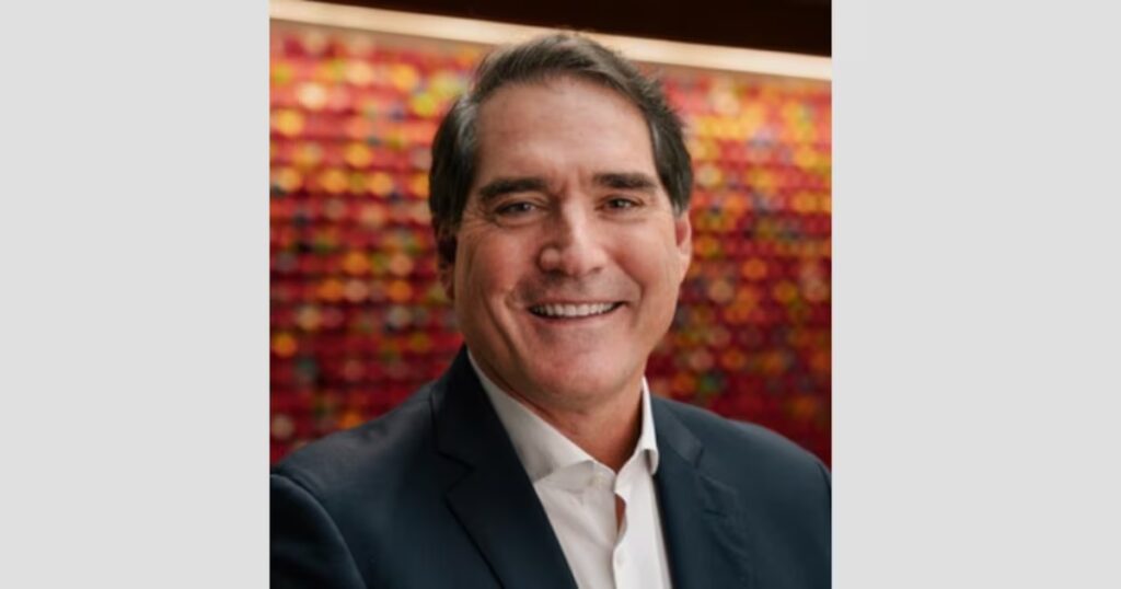 Coca-Cola Appoints Henrique Braun as New CEO, Starting March 2026. Food and Beverage Business Coca-Cola Appoints Henrique Braun as New CEO, Starting March 2026. american culture, bottle, close up, Coca-Cola, Cola, color image, cut out, drink, editorial, Food and Drink, horizontal, in a row, large group of objects, multi colored, no people, non-alcoholic beverage, photography, plastic, plastic bottle, product shot, rack, Red, refreshment, shelf, sign, six pack, Soda, studio shot, supermarket, USA, warehouse, wrapped Food and Beverage Business