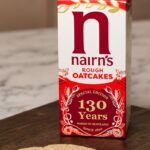 Nairn's Celebrates 130th Anniversary with a Fresh Take on Iconic Rough Oatcakes 130th anniversary, celebration, food, Here are some tags based on the title: Nairn's, Iconic, Reimagined, Rough Oatcakes, Scottish tradition, snacks Food and Beverage Business